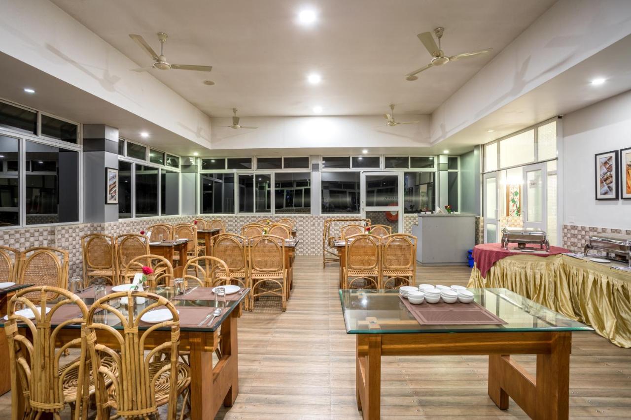 Monsoon Grande Hotel Munnar Kültér fotó